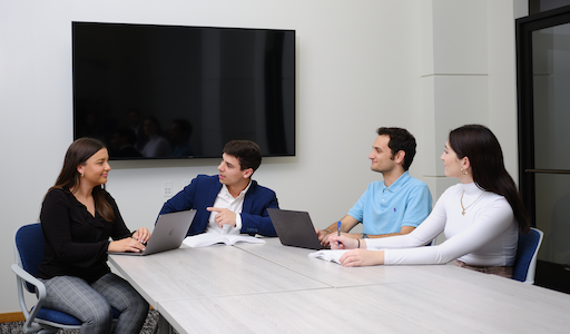 Students sitting around a table
